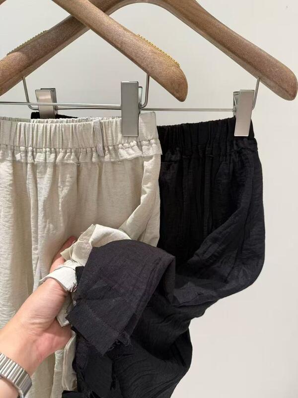 Summer hot and stylish 20% linen 18% nylon 62% synthetic silk Yamamoto Yohji style linen twisted pleated mid length skirt Fabric Features