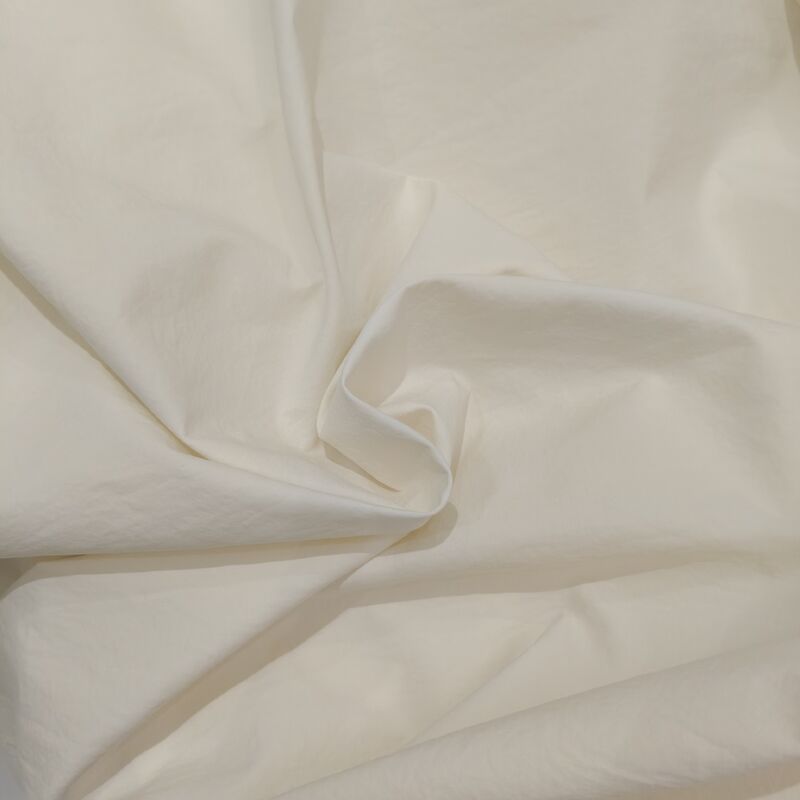80062 100% polyester cotton light luxury texture woven fabric, with a hanging and high-end skin friendly feel, suitable for high-end women's clothing production such as windbreakers